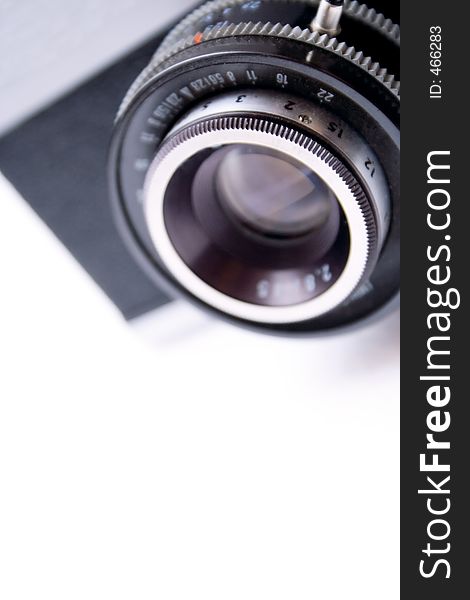 Vintage camera lens isolated on white background - shallow DOF