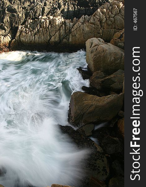 Waves crashing against rocks