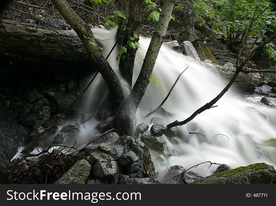 Overflowing stream in Yosemite National Park, California, U.S.A. Overflowing stream in Yosemite National Park, California, U.S.A.