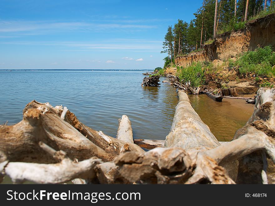 Greater snag, sea and blue sky. Sibir. Russia.