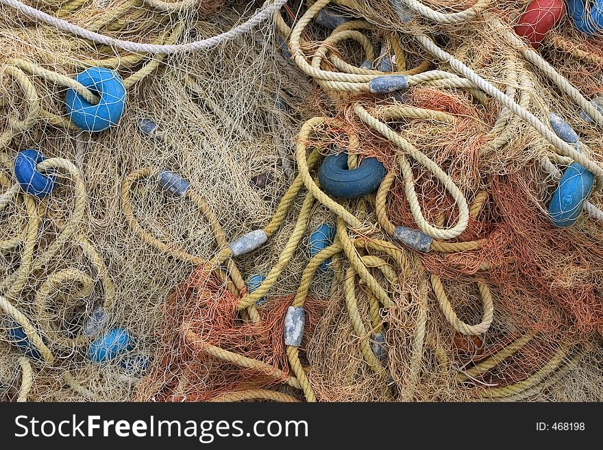 Piled up fishing net. Piled up fishing net