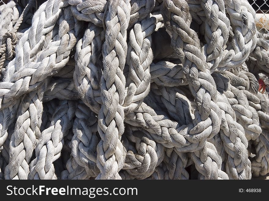 Heavy duty rope used for holding a ship to the dock. Heavy duty rope used for holding a ship to the dock.