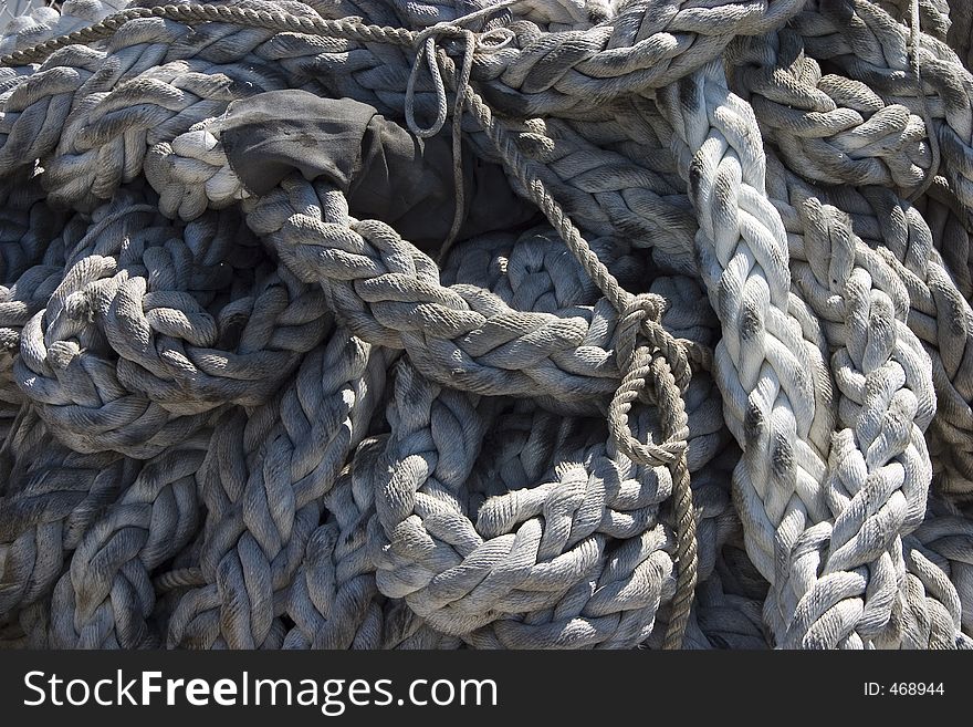 Heavy duty rope used for holding a ship to the dock. Heavy duty rope used for holding a ship to the dock.