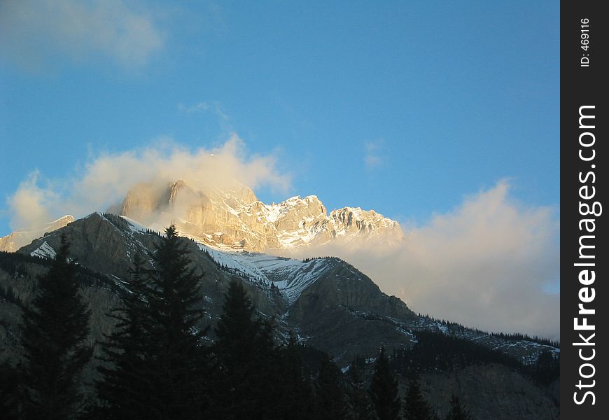 Shot of the sunlight on the a Canadian Rocky Mountain. Shot of the sunlight on the a Canadian Rocky Mountain.