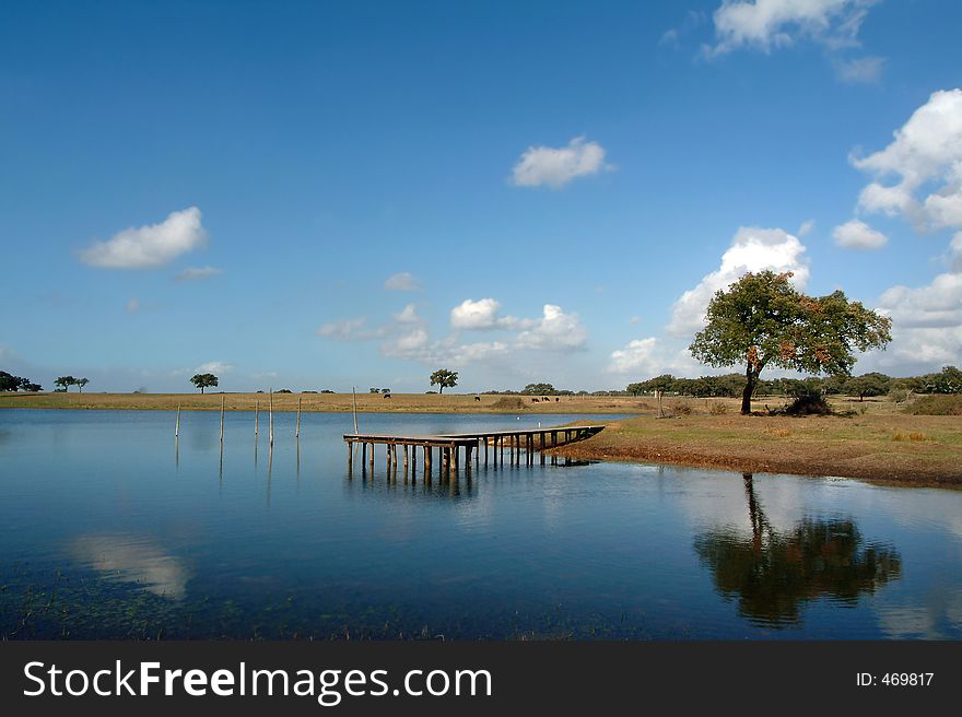 Pier in country lake. Pier in country lake