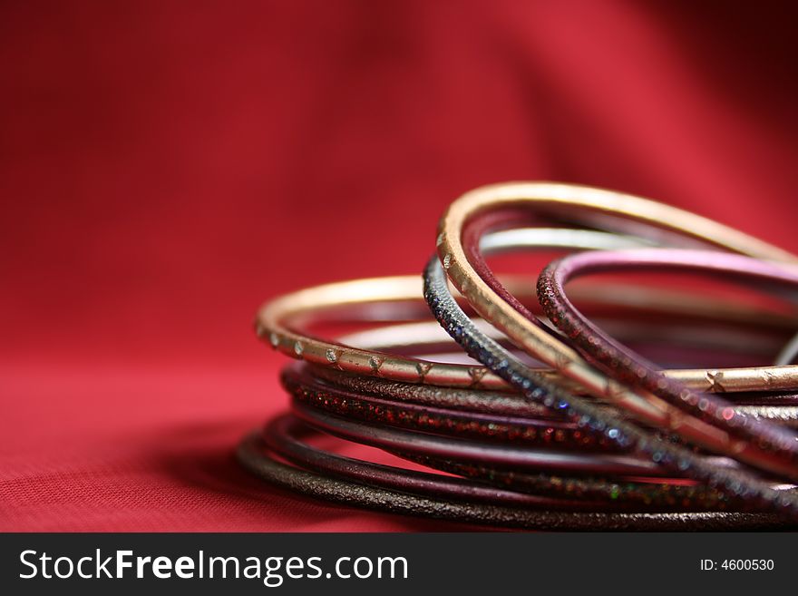 A wonderful wrist bracelets On red background