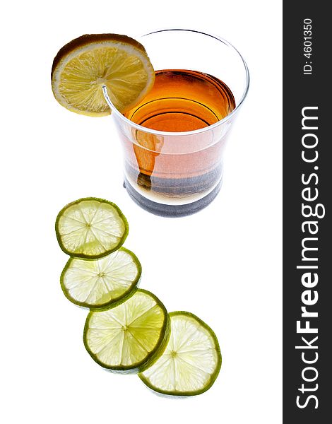 Bunch of lemon slices and backlit drink isolated on white. Bunch of lemon slices and backlit drink isolated on white