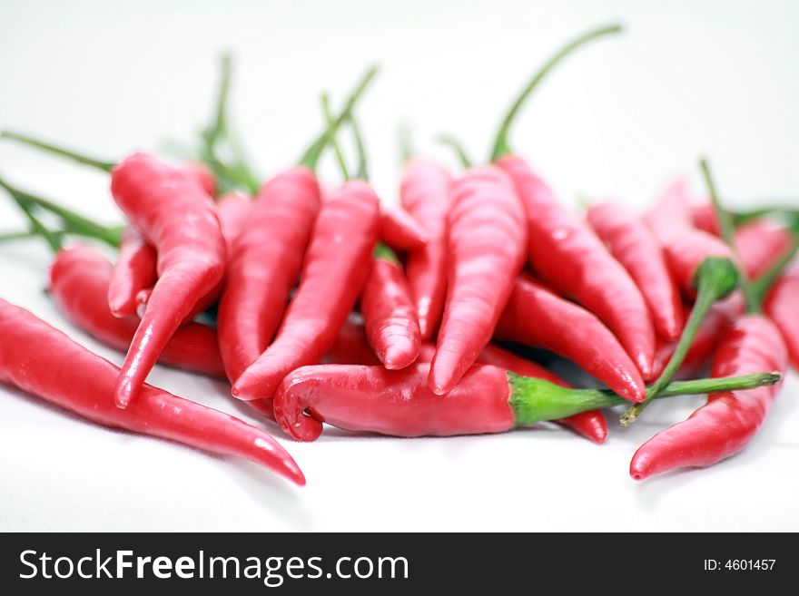 A photo of bunch of red chilli peppers