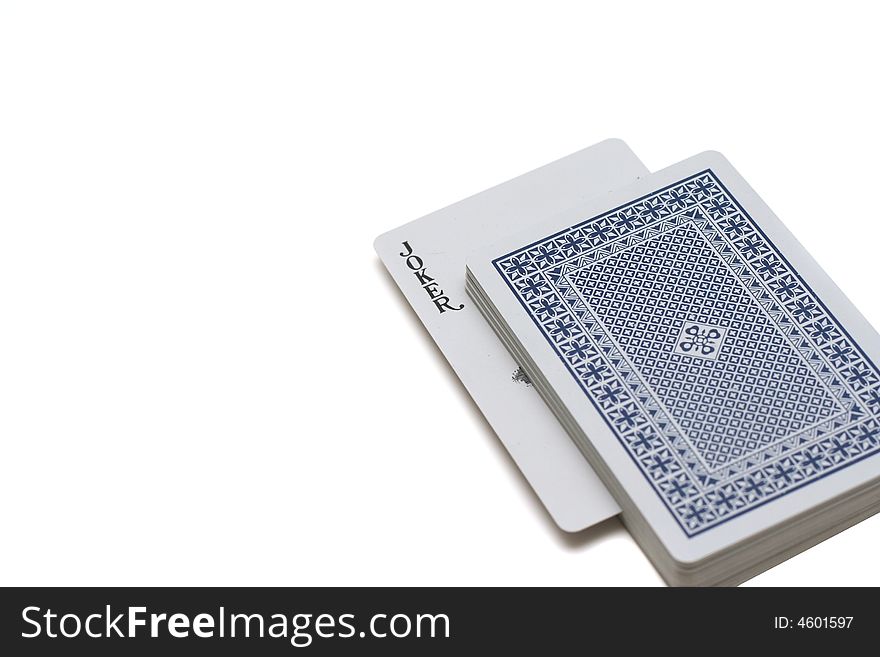 Playing cards laying on a white background