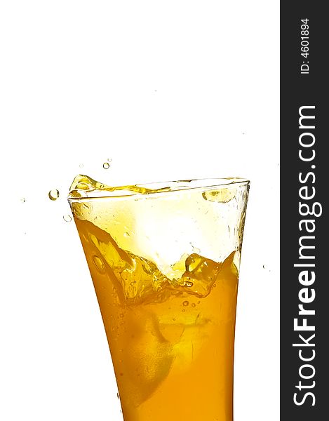 Glass with juice on the white background