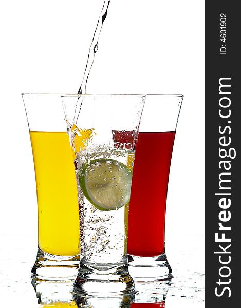 Glasses with juice and lemon