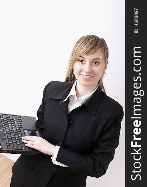 An attractive working woman with computer