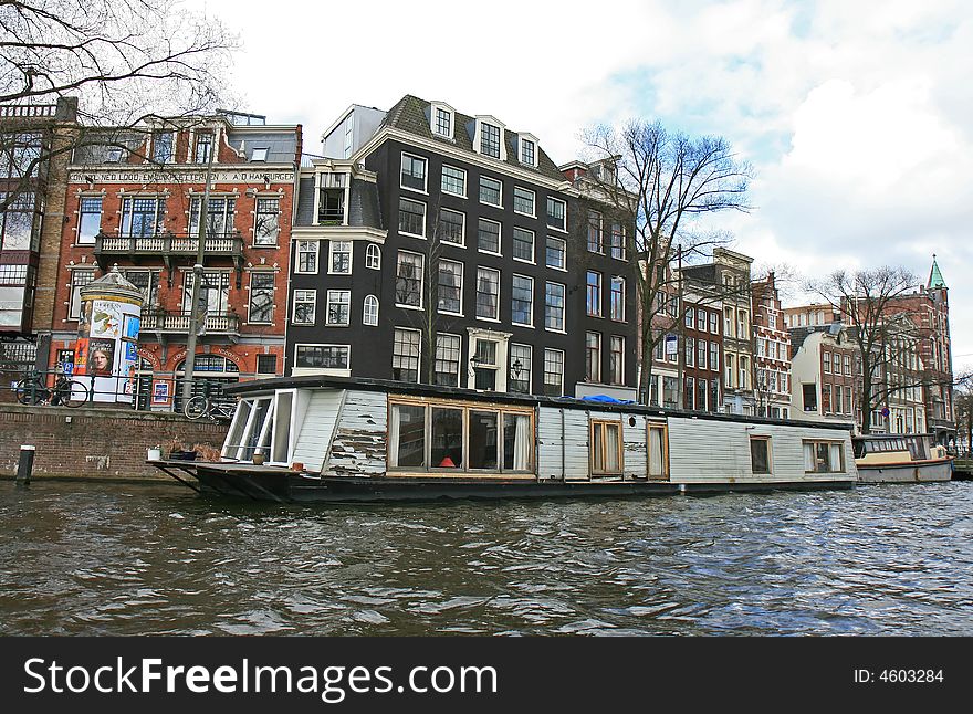 The scenery along the street and canal of Amsterdam