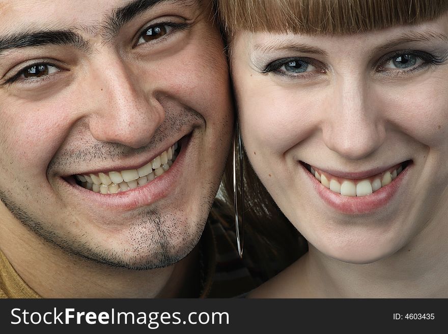 Young couple feeling happy and look at camera