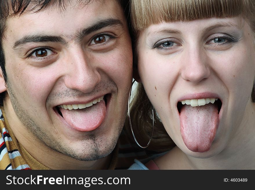 Young couple feeling happy. Look at camera