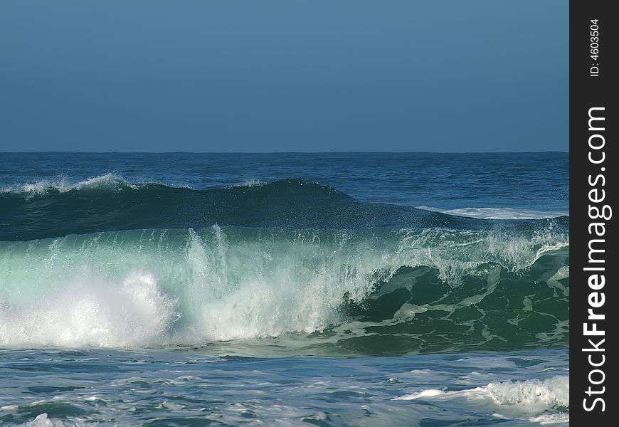 Breaking wave and surf on Northern California shore