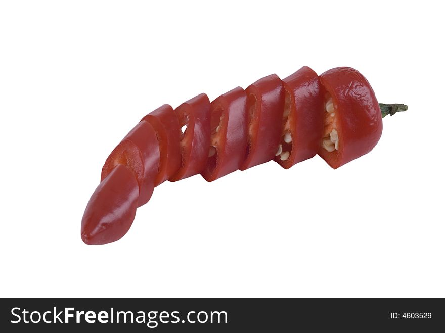 Red chilli, sliced and isolated on white. Includes clipping path. Red chilli, sliced and isolated on white. Includes clipping path