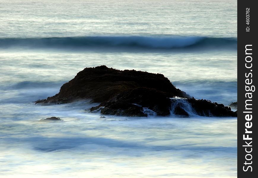 Time lapse photo of waves, surf, and rocks on California beach. Time lapse photo of waves, surf, and rocks on California beach