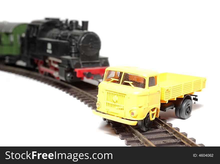 Black train and yellow car. Black train and yellow car