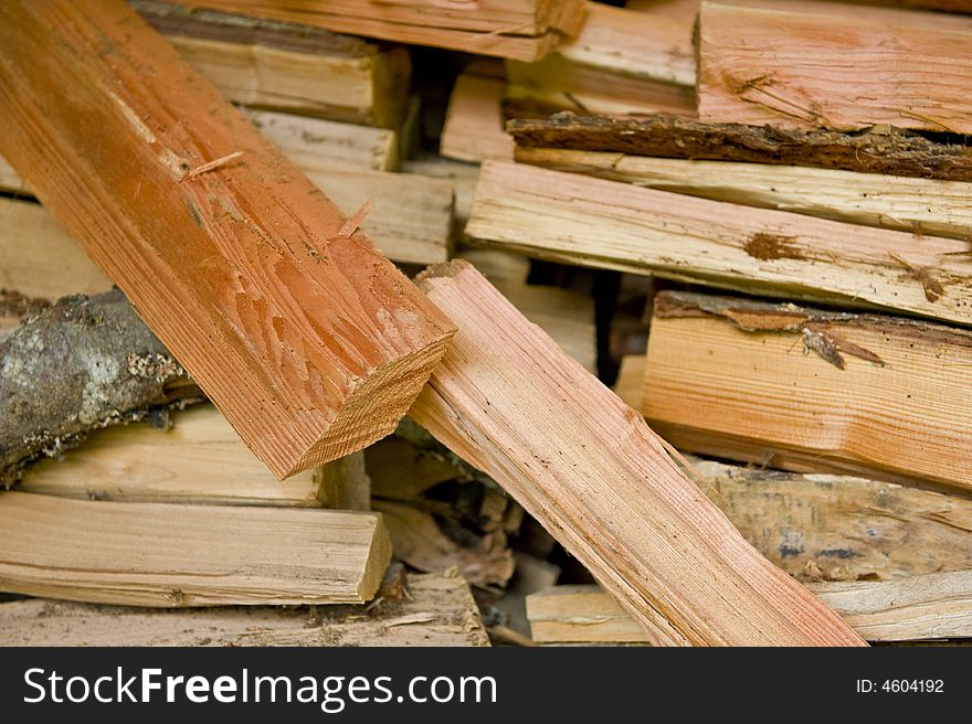 Mixed stack of split fire wood. Mixed stack of split fire wood