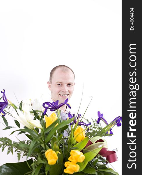 Handsome man with bunch of flower. Handsome man with bunch of flower.