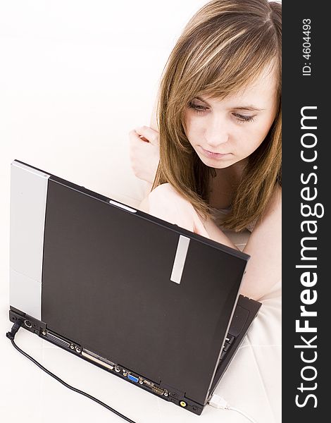 An attractive woman using a laptop. An attractive woman using a laptop.