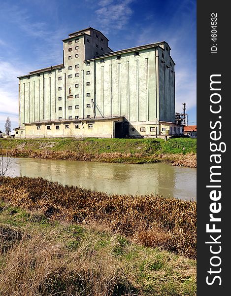 A view with a concrete silo. A view with a concrete silo