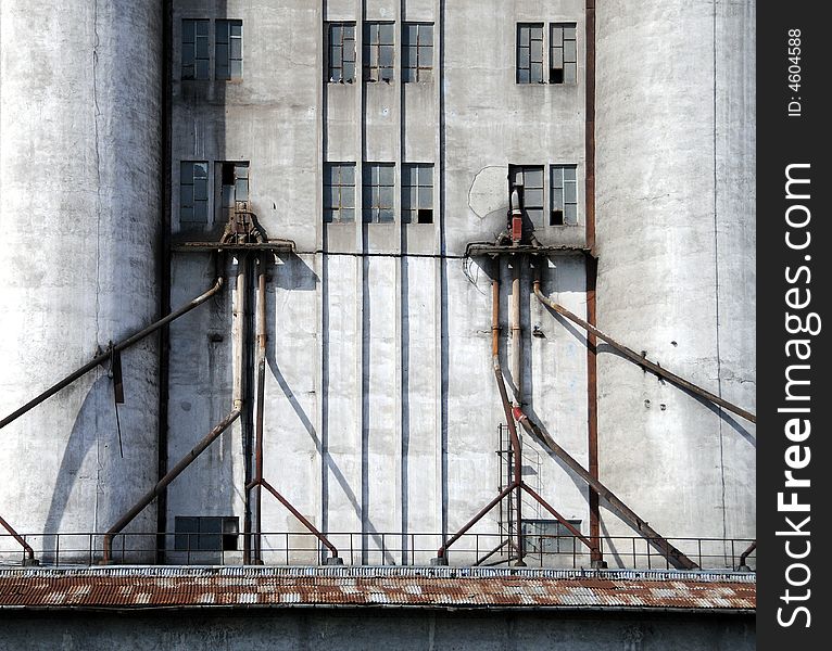 A view with a concrete silo. A view with a concrete silo