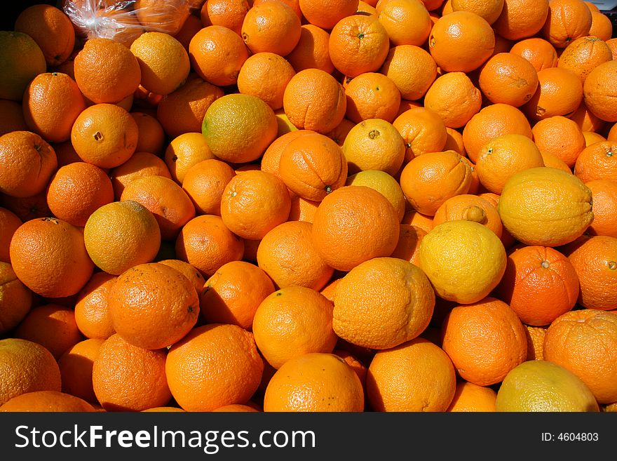 A lot of sunny oranges and tangerines