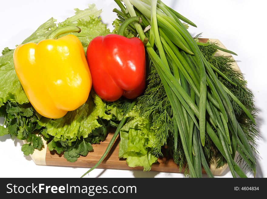 Yellow and red pepper with verdure, onion and dill