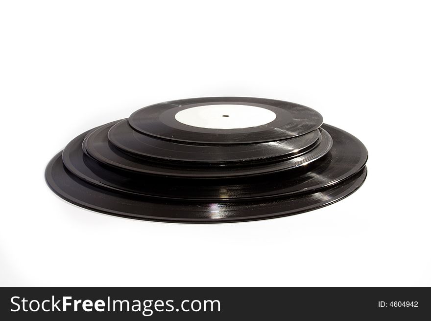 Aging phonograph record on white background