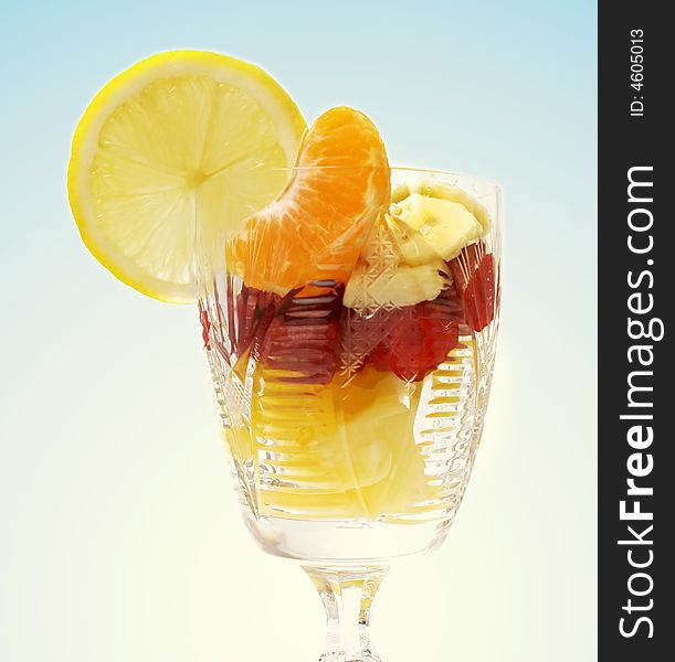 Fruits salad in the cup isolated