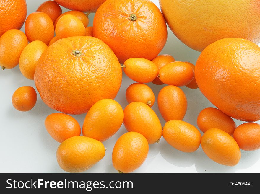 Citrus fruits on a glass table