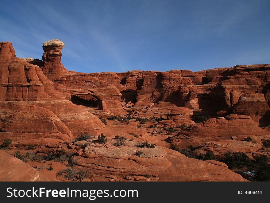 View of the red rock formations in Arches National Park with blue sky�s. View of the red rock formations in Arches National Park with blue sky�s