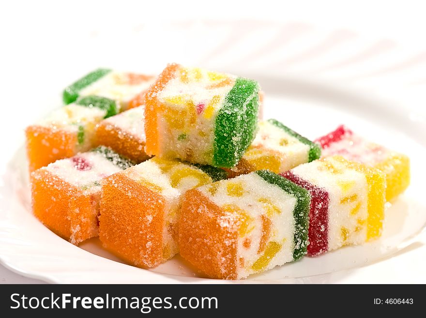 Macro picture of Slices fruit jelly with sugar