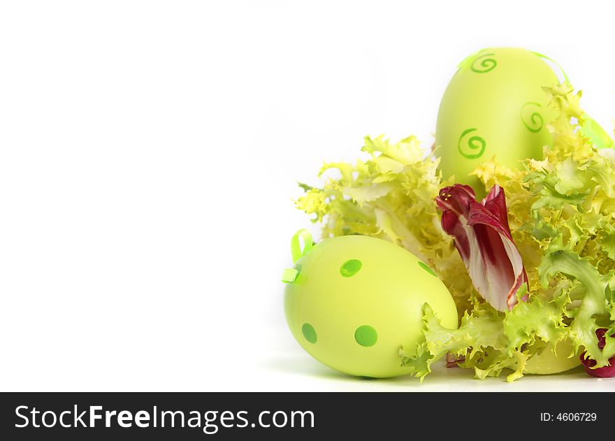 Easter eggs in salad separate on white