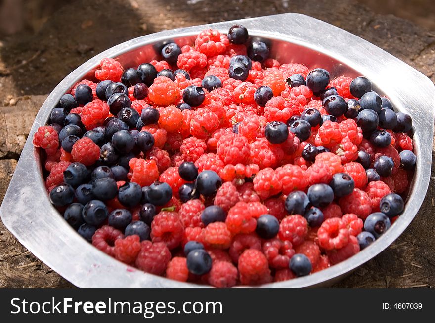 Plate with raspberry and blueberry