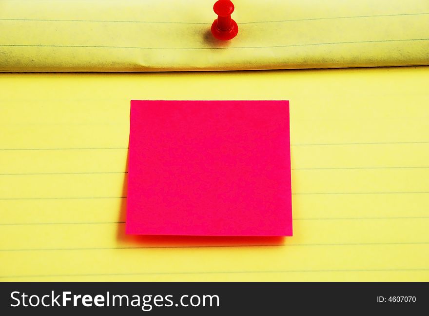 Stock pictures of a notepad with a pin and a post sticky note. Stock pictures of a notepad with a pin and a post sticky note