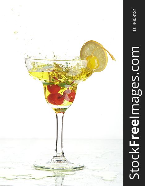 Still life with glass with drink on the white background