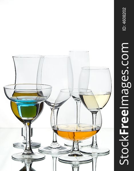 Still life with glasses with drink on the white background