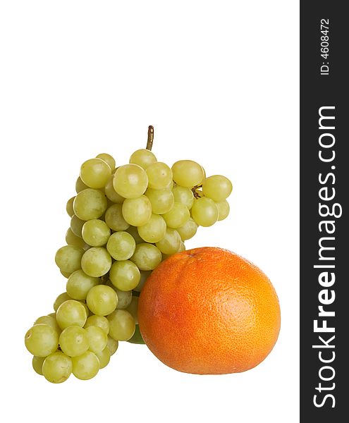 Grapes and grapefruit on white background