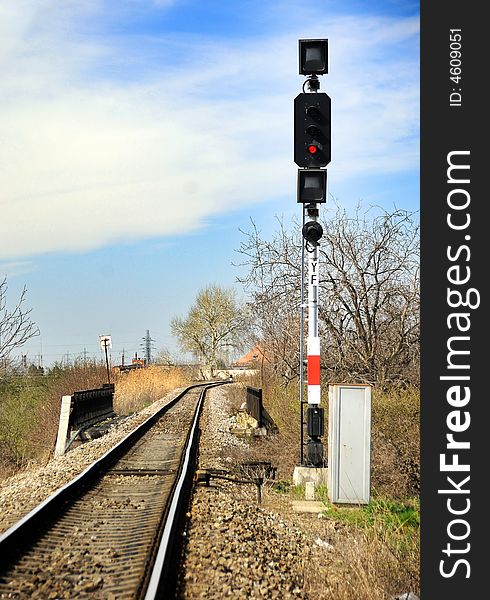 A vertical shot of railroad tracks extending to the horizon.