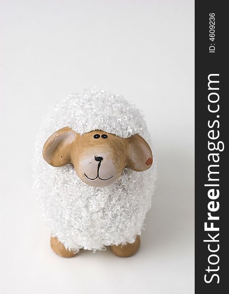 Easter decoration, a statuette of a smiling sheep