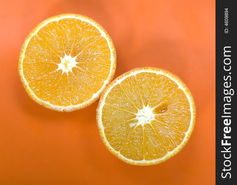 Two delicious half orange isolated