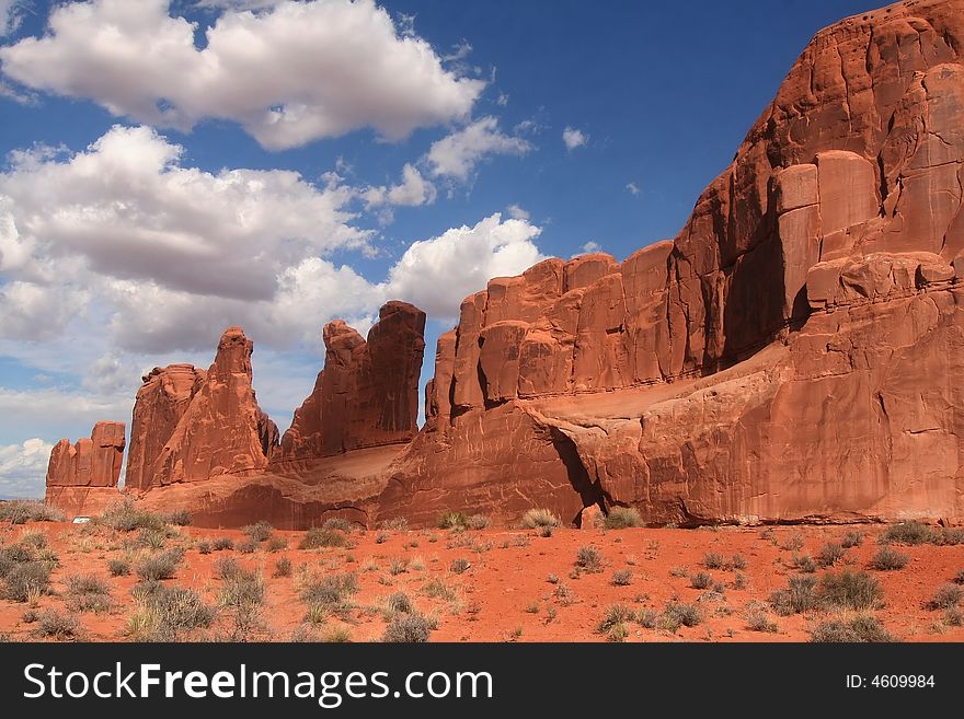 View of the red rock formations in ArchesNational Park with blue sky s. View of the red rock formations in ArchesNational Park with blue sky s