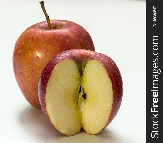 Delicious one and 3/4 of apple on white background. Delicious one and 3/4 of apple on white background.