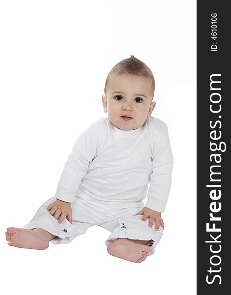 Cute little boy dressed in white, isolated on white background