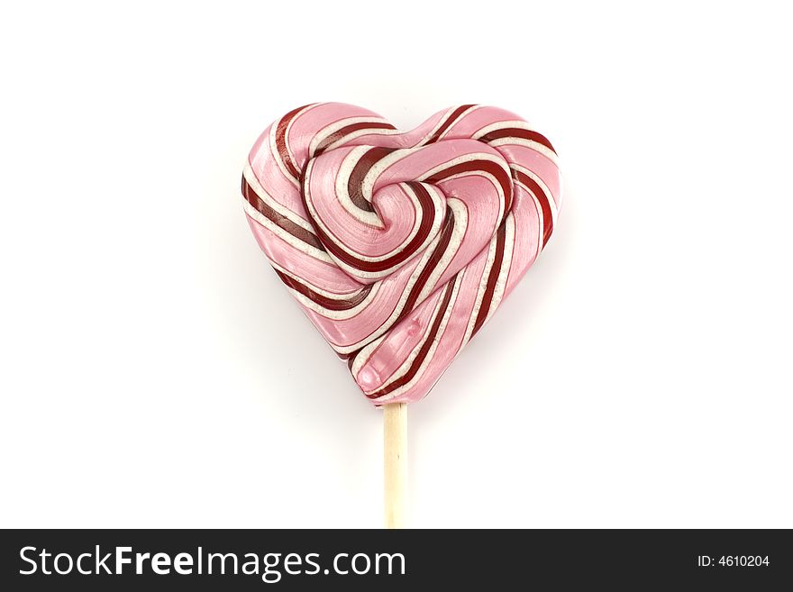 Pink lollypop on white background. Pink lollypop on white background