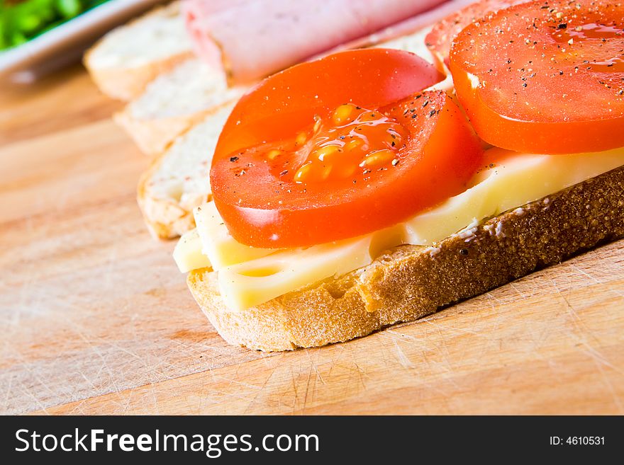 Ham, cheese and tomato sandwich. Ham, cheese and tomato sandwich