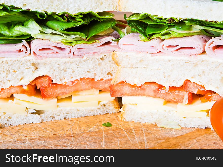 Ham, cheese, tomato and lettuce sandwich. Ham, cheese, tomato and lettuce sandwich